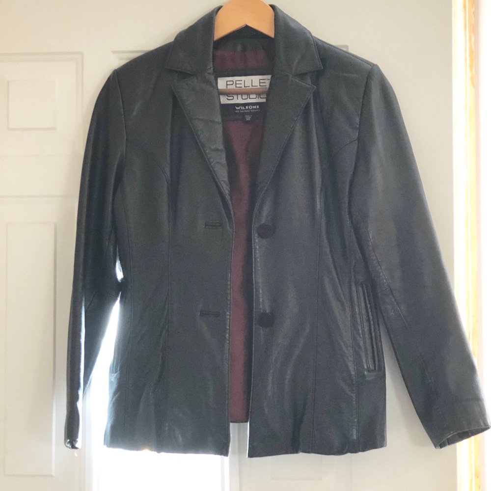 Black 100% leather jacket.
